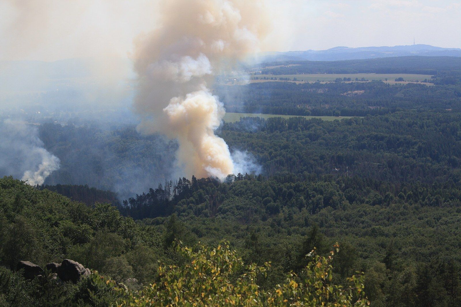 Smoke rising from the forest near Hřensko at the start of the July 2022 wildfire
