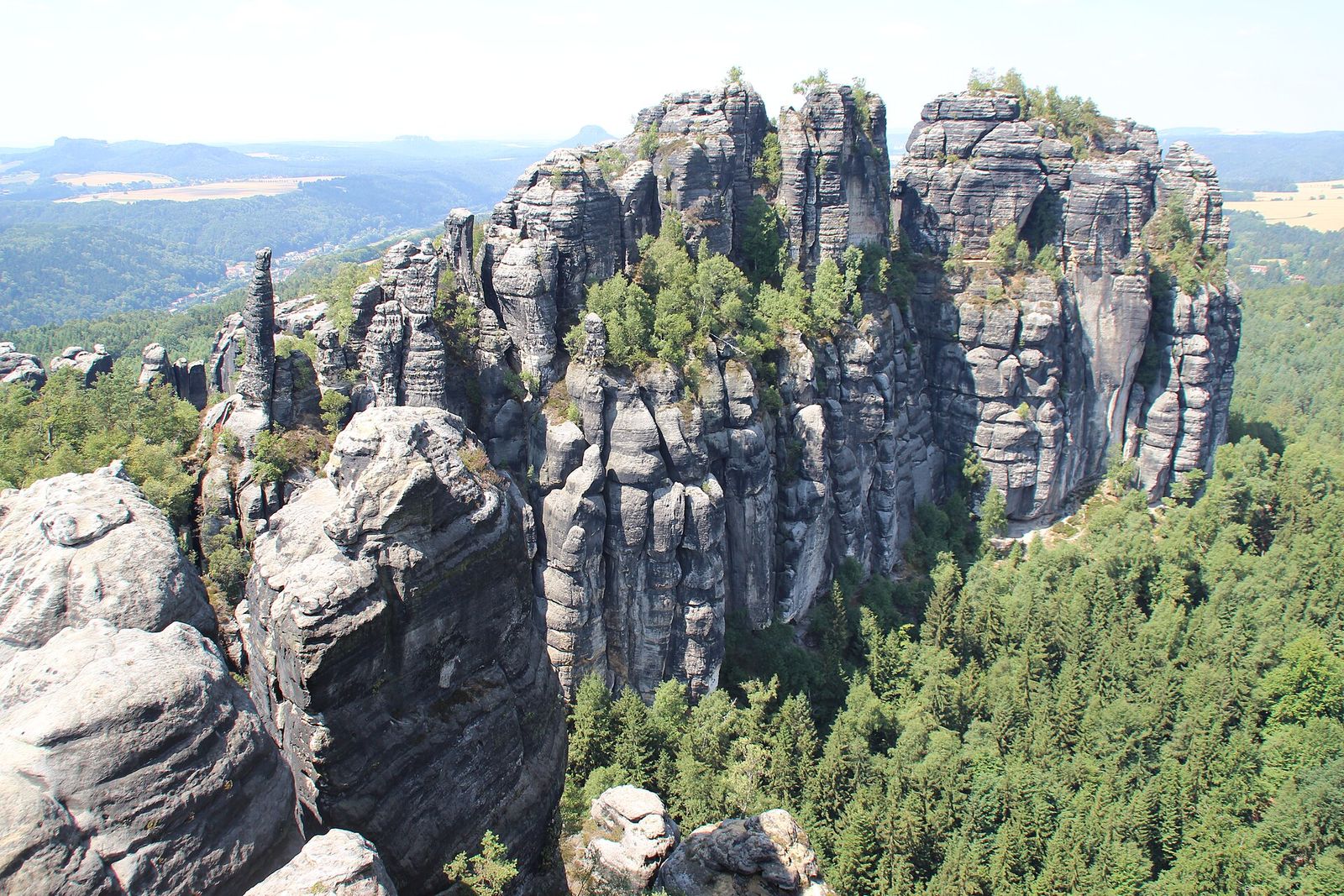 The jagged sandstone towers of the Schrammsteine above the forests of Saxon Switzerland